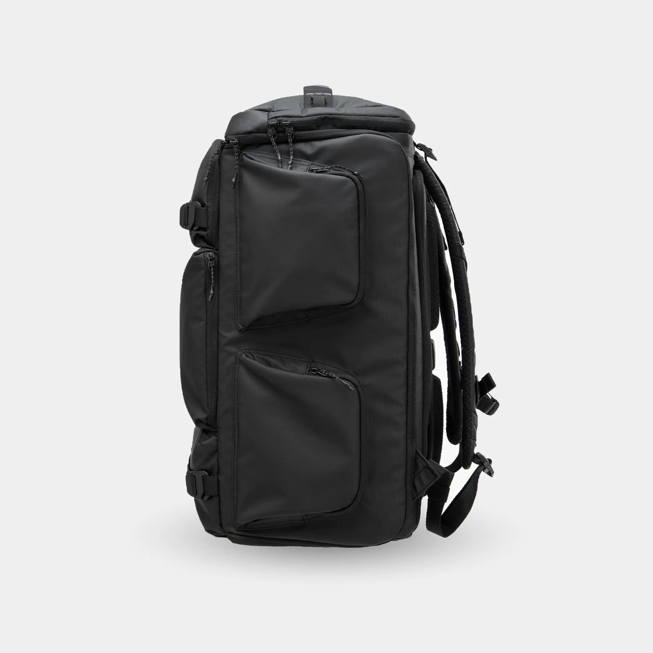 Black backpack on a light gray background