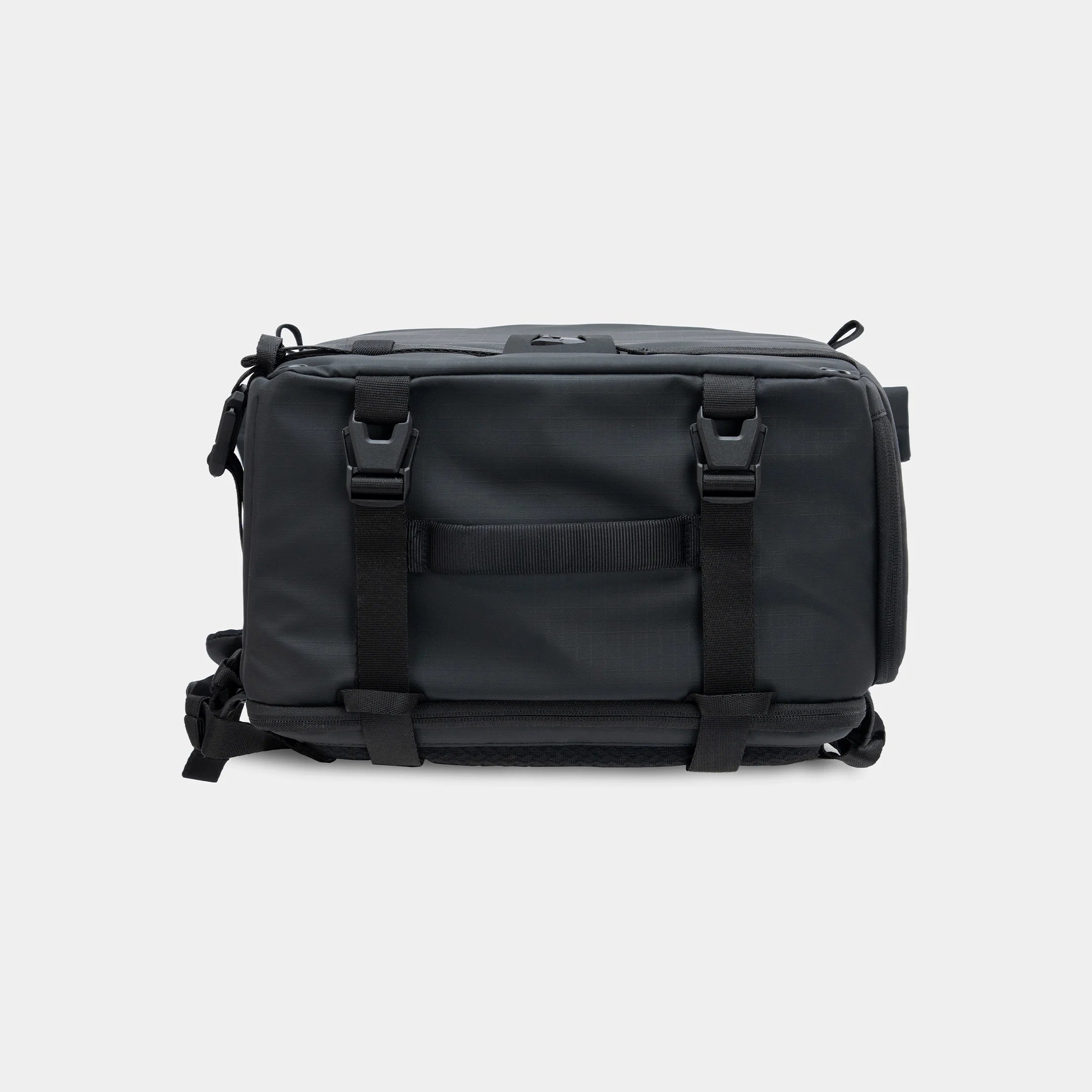 Black backpack on a light gray background