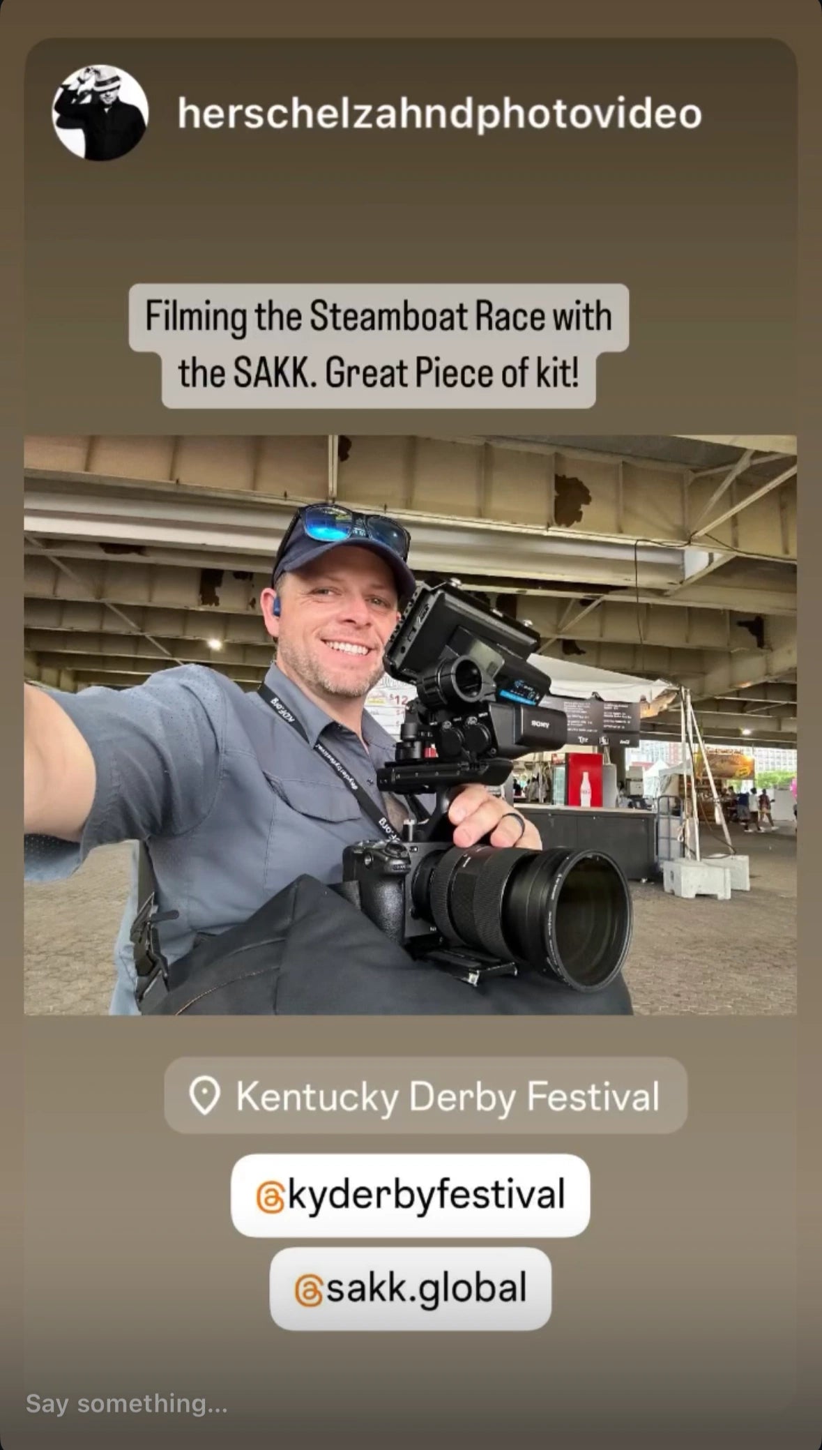 Instagram story screenshot of a man filming at the Kentucky Derby Festival using a Sakk Gear bag to support his camera; caption praises the bag for filming the steamboat race