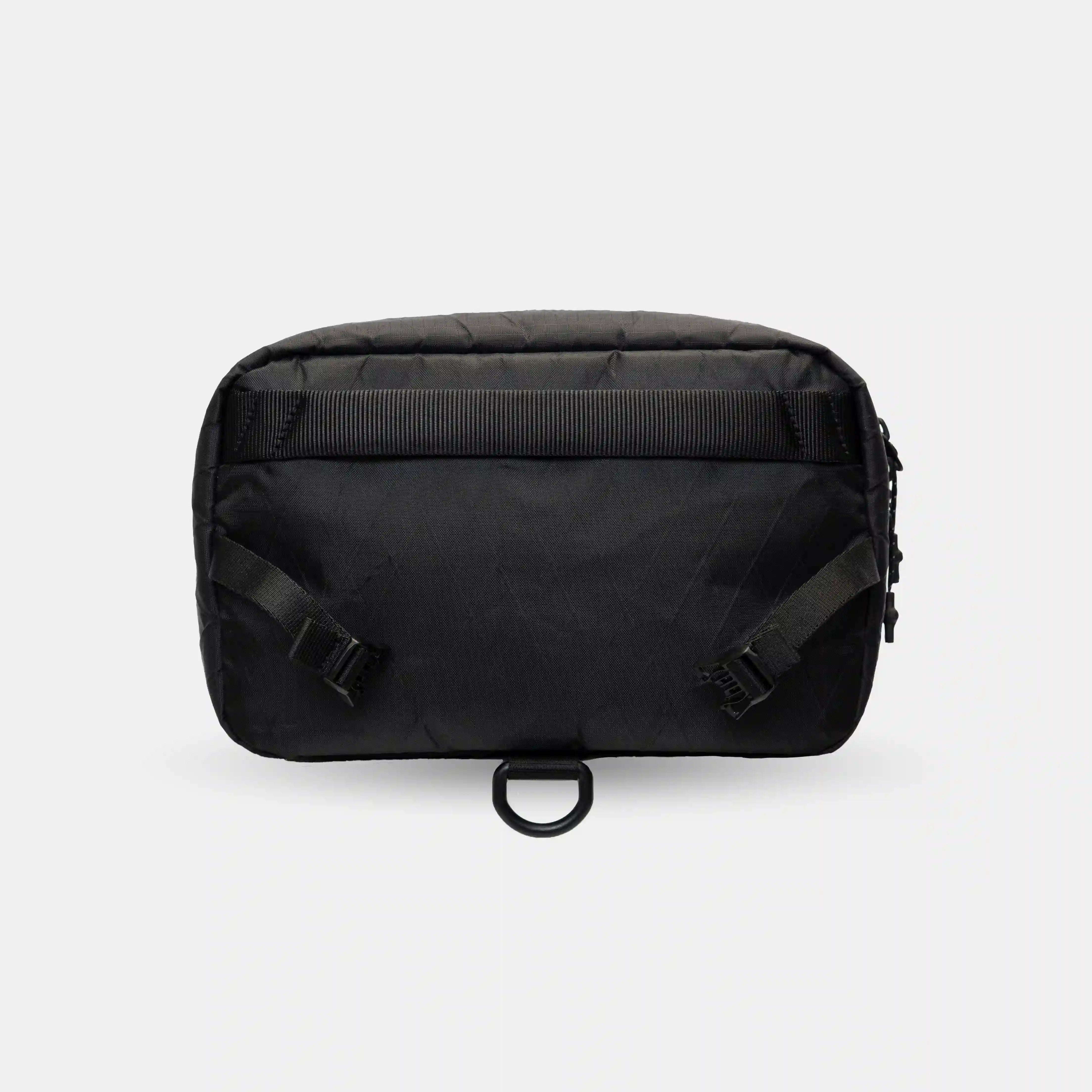 Tech accessory pouch that attaches to larger backpacks like Sakk Pack V2 and Pack Cube.