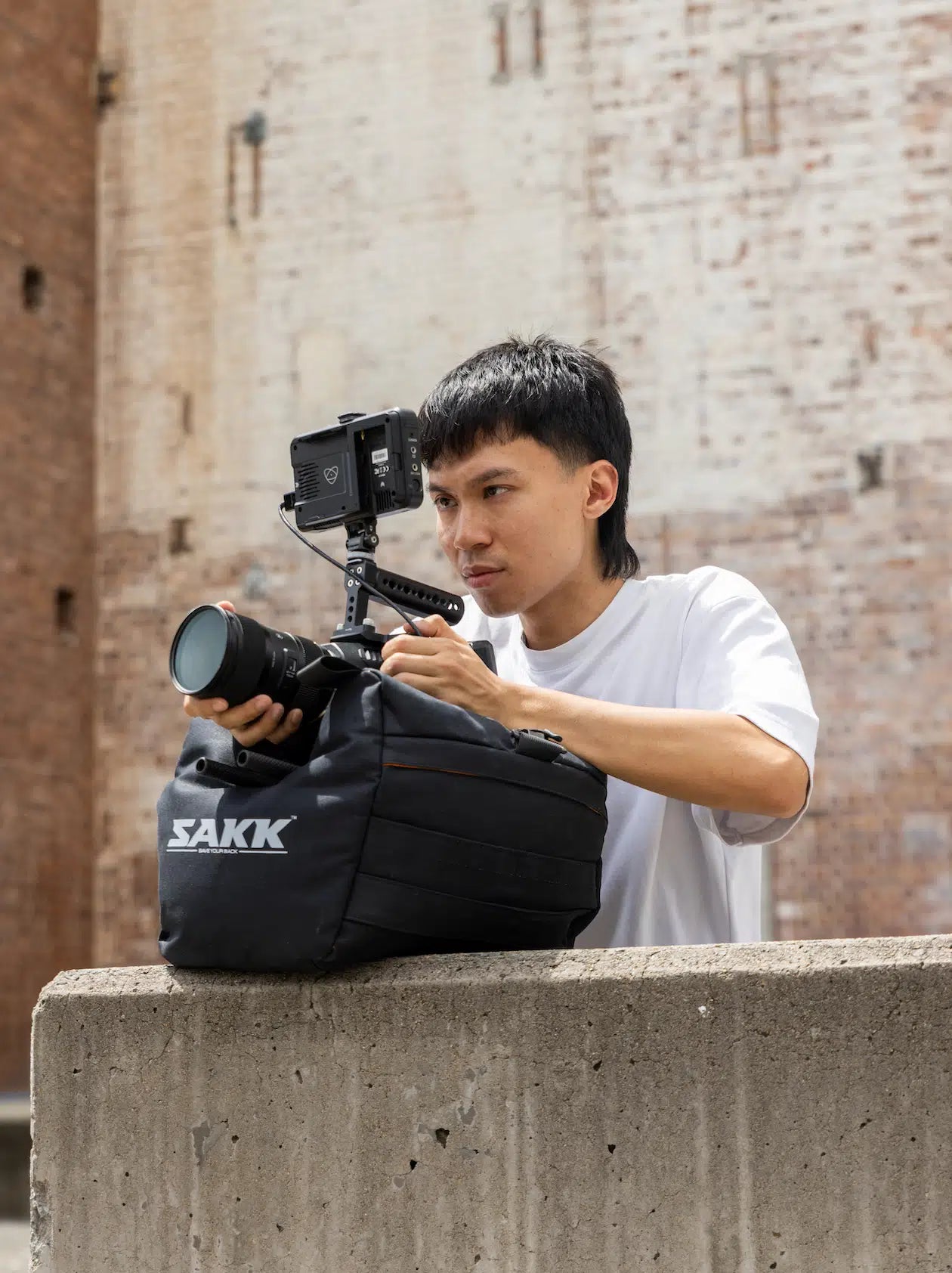 Camera support with flexible shape, conforms to surfaces and holds steady under pressure.