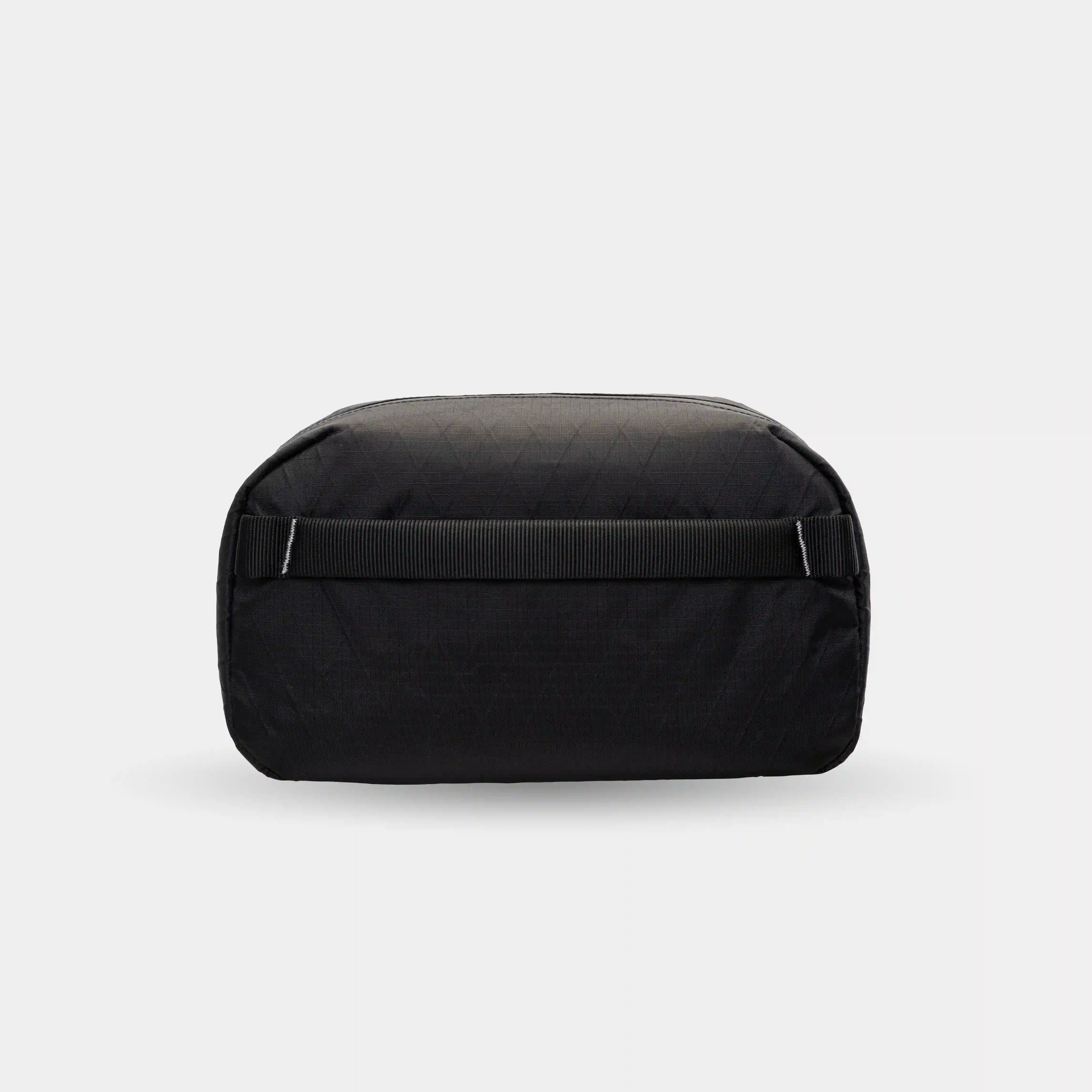 Compact travel organizer for cables, SD cards, and other tech essentials.