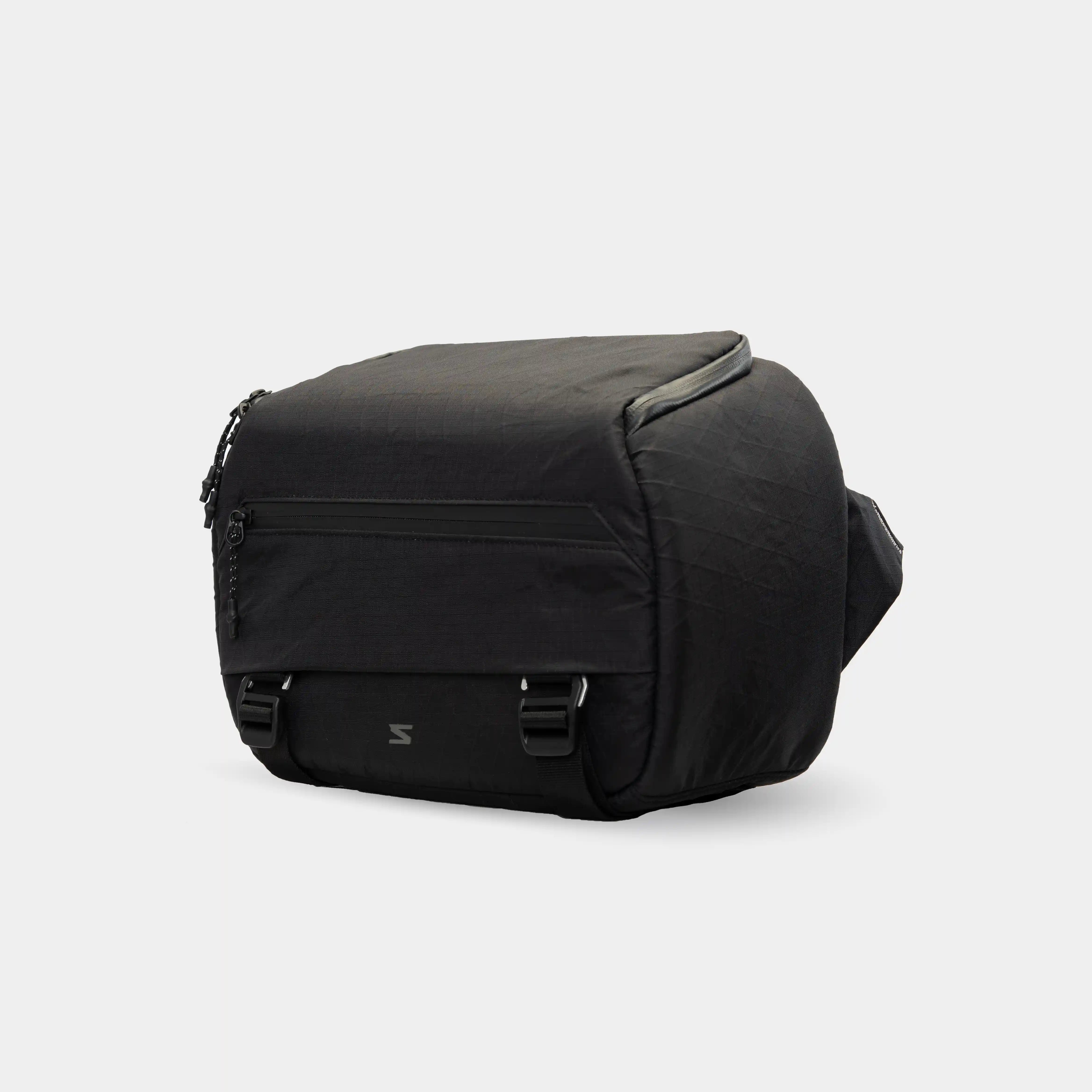 Minimalist camera sling for creators shooting light and fast.