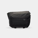 Compact camera sling bag for laptop, camera, lenses, and daily tech.