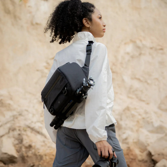 Unisex 9L sling for city creators and business travelers. Weatherproof finish with gear slots.