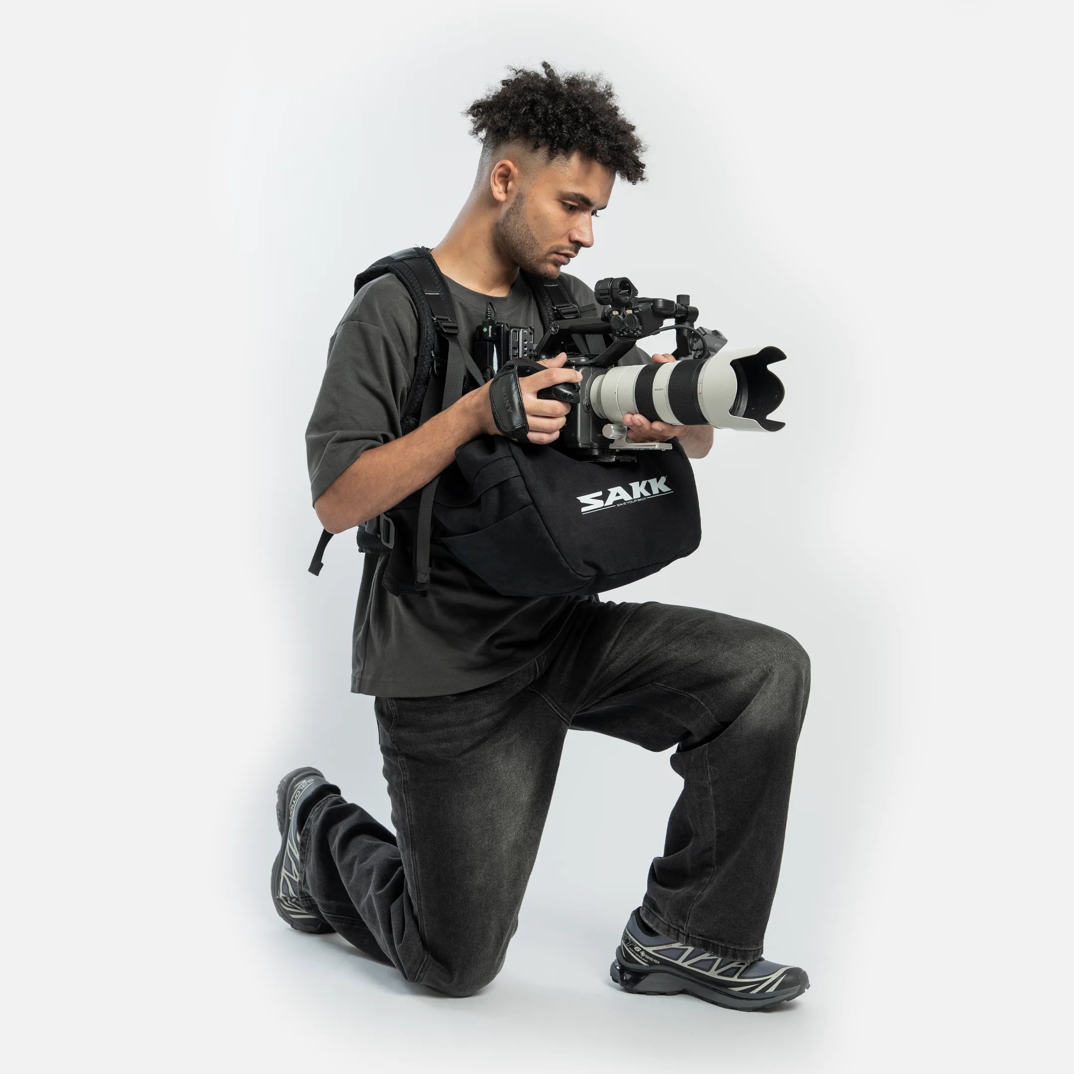 Adjustable body harness for camera rigs. Balanced load and back support for long hours on set.
