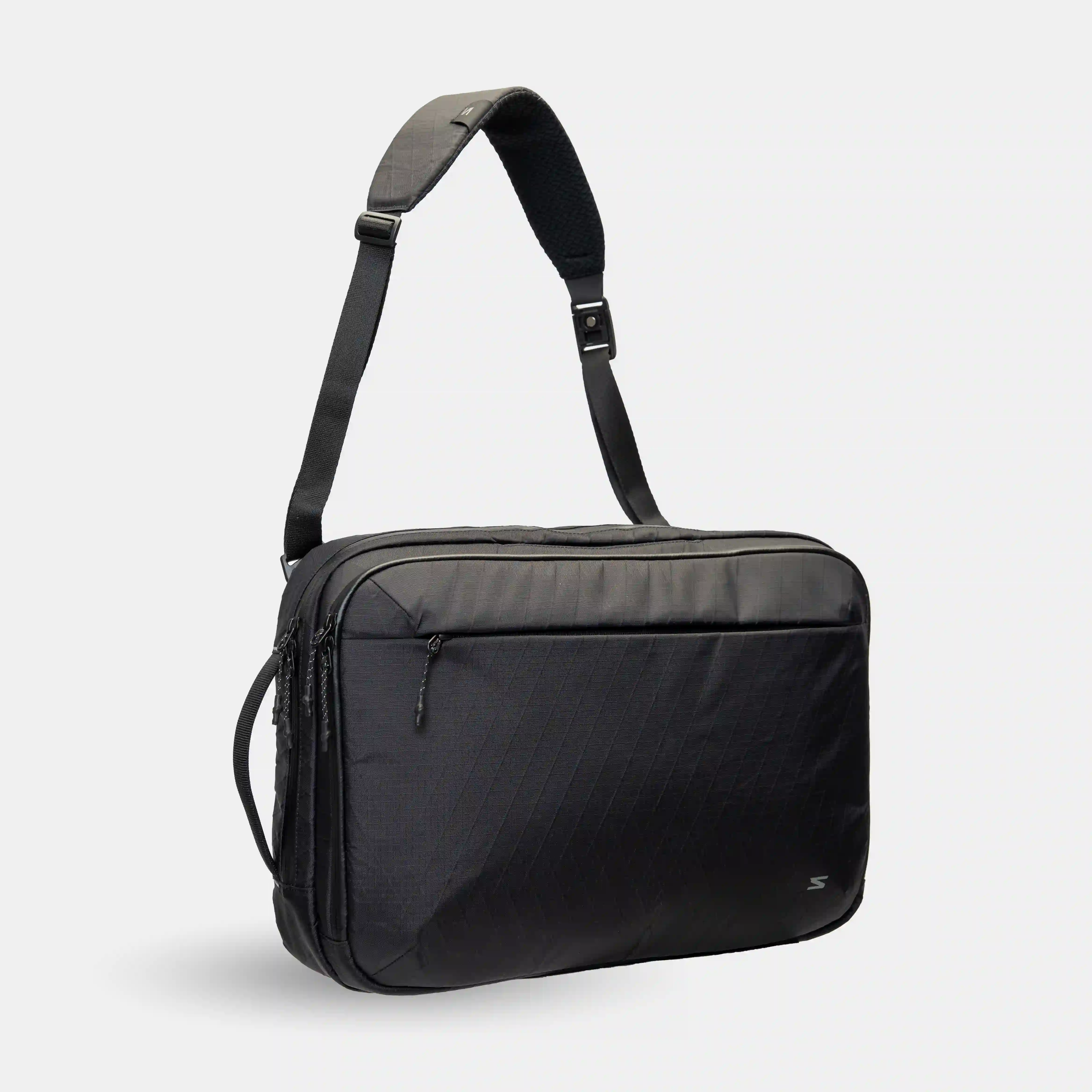 Weatherproof 3-way laptop bag with YKK zippers and durable nylon body.