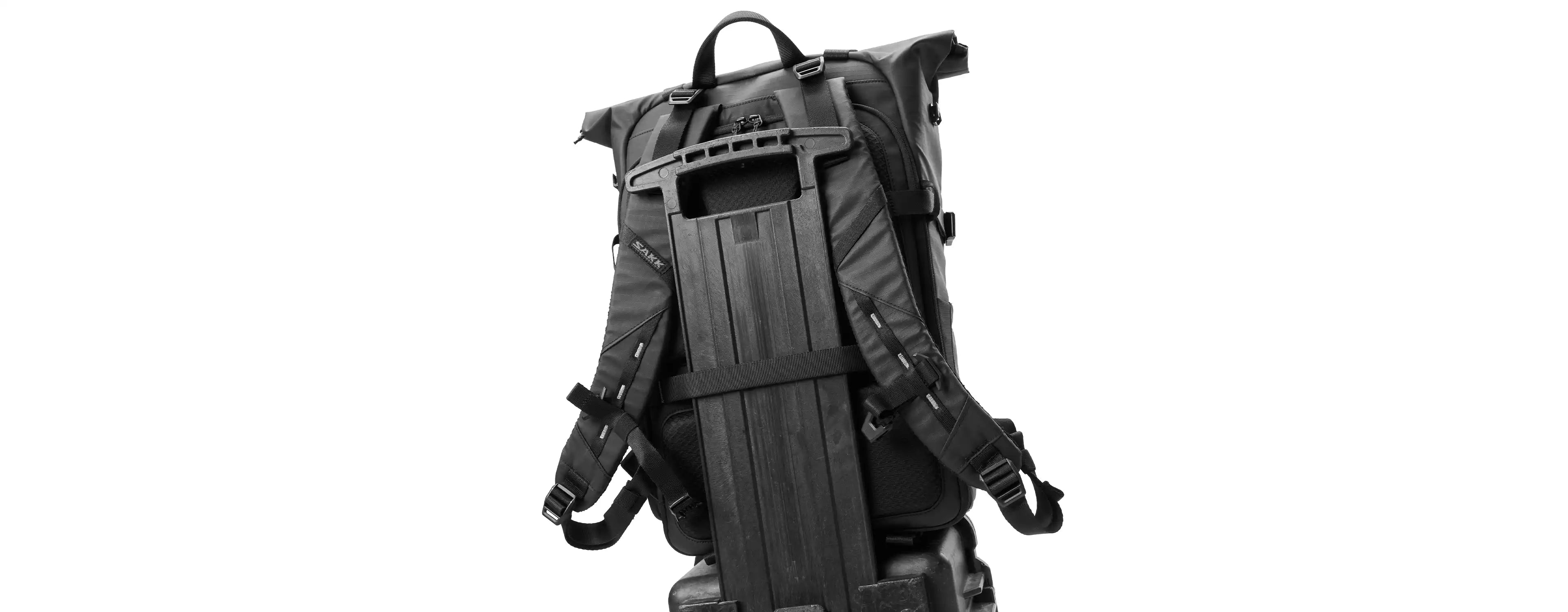 Black tactical backpack on a white background