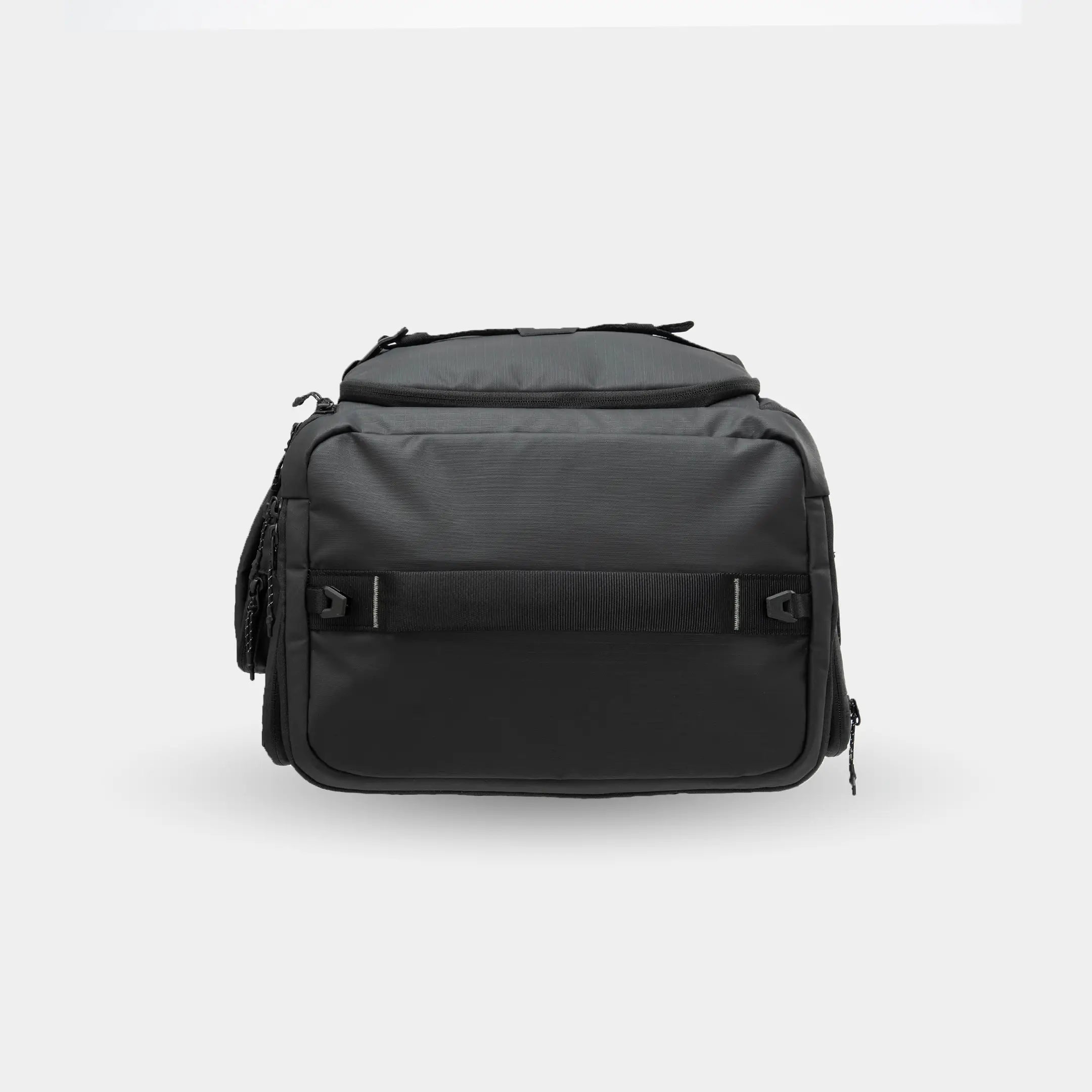 Black backpack on a light gray background