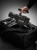 RED Camera on a black bag against a gray background