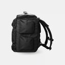 Black backpack on a light gray background