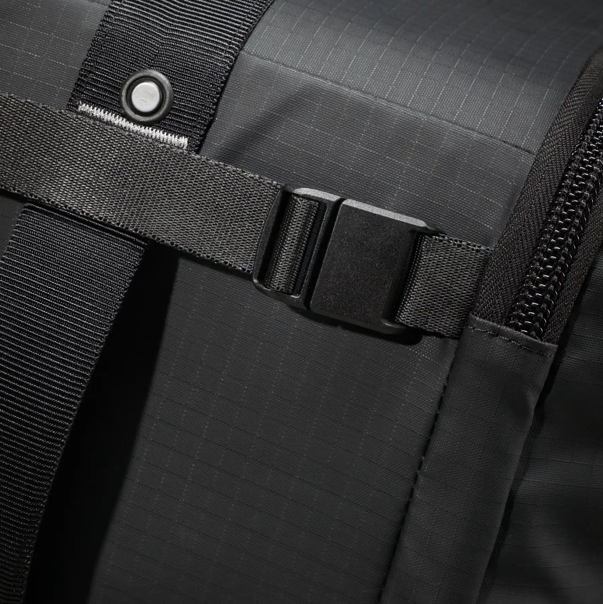 Close-up of acetal hardware used in the bag, providing secure connections and reliable everyday use.