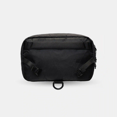 Tech accessory pouch that attaches to larger backpacks like Sakk Pack V2 and Pack Cube.
