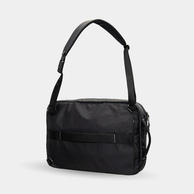 Laptop bag that transforms into backpack, crossbody, or professional briefcase.