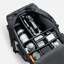 Backpack with multiple compartments for camera gear, lenses, and accessories.