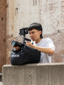Camera support with flexible shape, conforms to surfaces and holds steady under pressure.