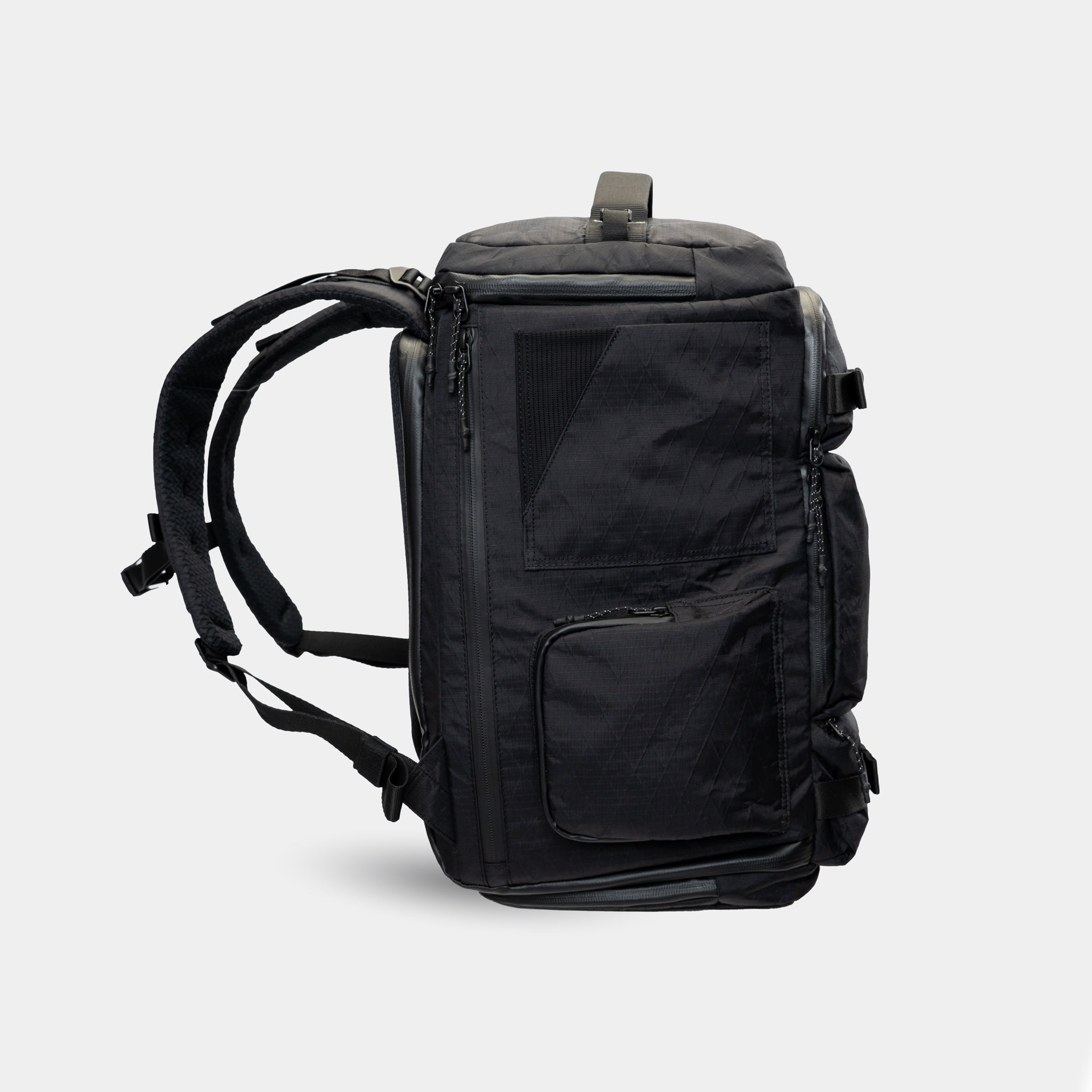 reathable mesh back panel with load support. Keeps creators cool during long shoots.