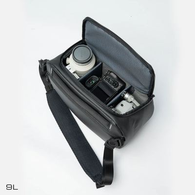 Compact 9L camera sling with waterproof design and padded compartments.