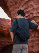 Compact camera sling ideal for outdoor photography. Lightweight, durable, with easy-access storage for camera gear.