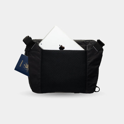 Compact travel sling bag for cameras, lenses, laptop, and accessories. Keeps gear organized and protected.
