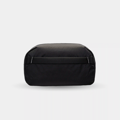 Compact travel organizer for cables, SD cards, and other tech essentials.