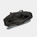 Minimalist creator tote fits iPad, mirrorless camera, and personal gear. Great for mobile setups.