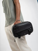 Everyday tech organizer case with structured compartments for gadgets and tools.