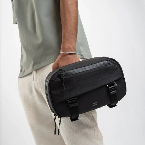 Everyday tech organizer case with structured compartments for gadgets and tools.
