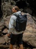 25L rolltop backpack for hiking and outdoor adventures. Water-resistant with space for shoes, clothes, and essentials.