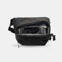 Lightweight sling bag for camera and laptop. Multiple compartments keep tech gear organized and secure.