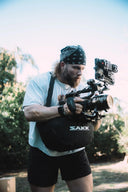 Lightweight camera support for outdoor shoots provides steady framing on uneven terrain