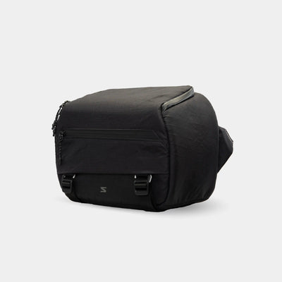 Minimalist camera sling for creators shooting light and fast.