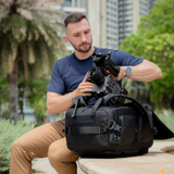 Multi-zone storage with zipped pockets and tech pouch compatibility for efficient packing.
