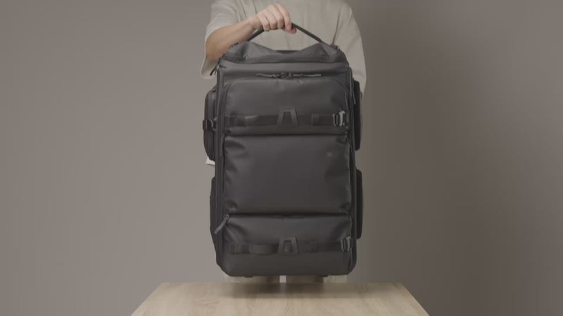 Video showcasing the Sakk Pack Cine Pro Roller packed with a cinema camera, multiple lenses, and filming accessories, demonstrating how everything fits neatly inside for organized storage and easy transport.