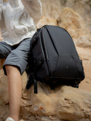Travel 28L camera backpack for creators carrying cameras, laptop, and clothing.