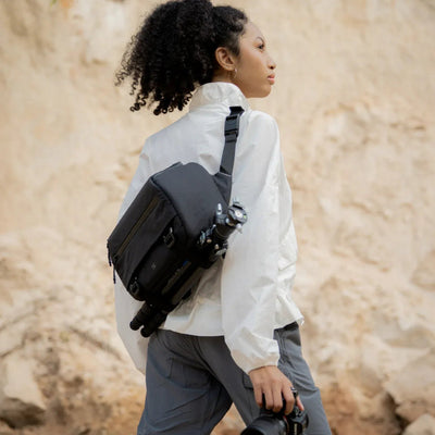 Unisex 9L sling for city creators and business travelers. Weatherproof finish with gear slots.
