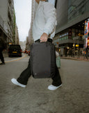 Urban commuter laptop bag that adapts from crossbody to backpack.